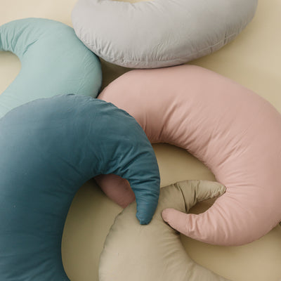 Crescent Nursing Pillow #color_stone #color_eucalyptus #color_bluejay #color_blush #color_fawn